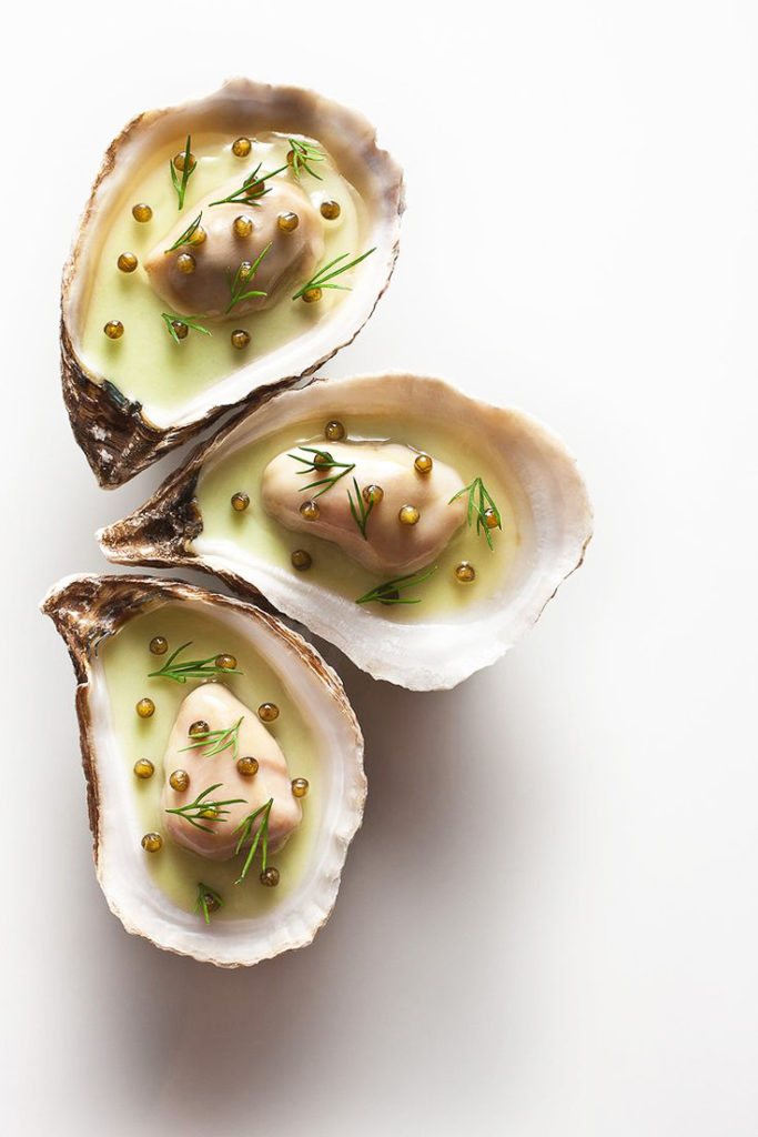 Oysters with passion fruit caviar.